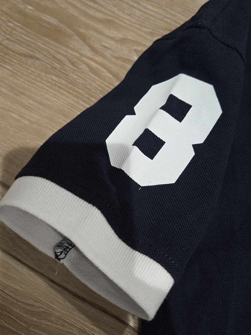 Tommy Hilfiger Navy Polo with White Lettering and Red Logo - Picture 3 of 7